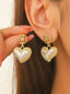 Boucles d'oreilles pendantes en forme de cœur et de perles en or