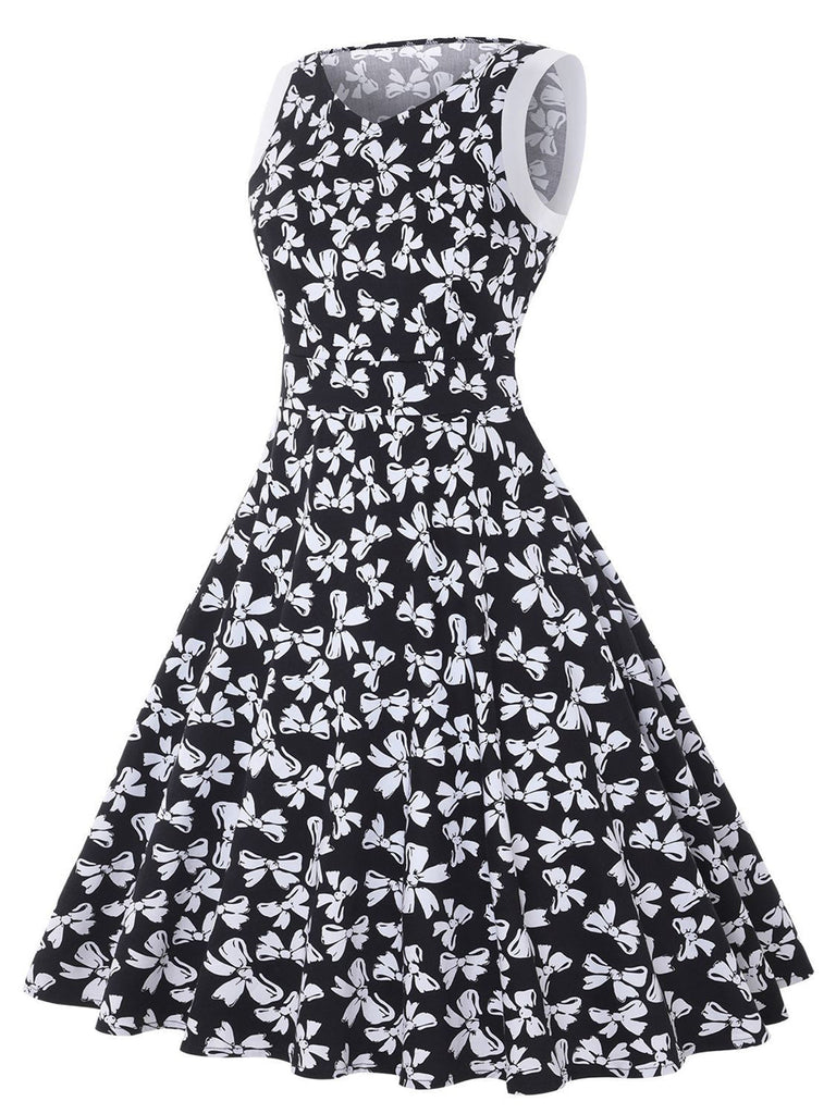 Robe trapèze noire sans manches avec nœud papillon des années 1950