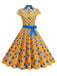 Robe trapèze à pois et nœud à revers des années 1950