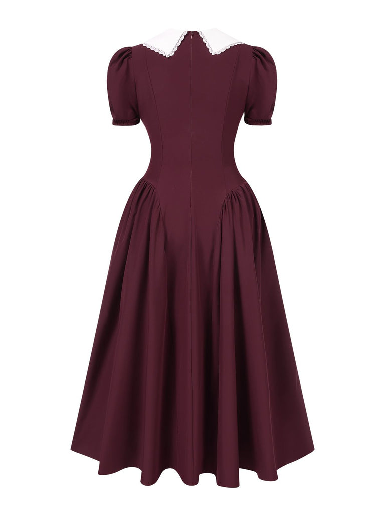 Robe bordeaux manches bouffantes à revers larges contrastées des années 1950