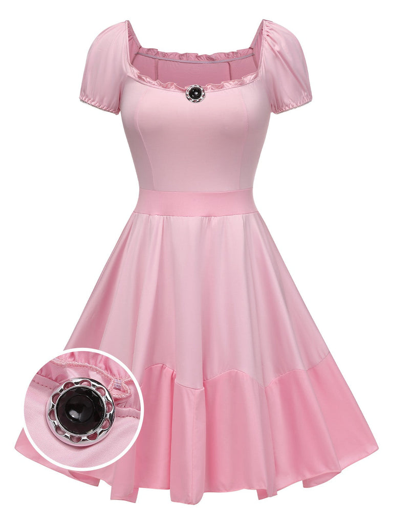 Robe bouffante rose colorblock Mary's des années 1950