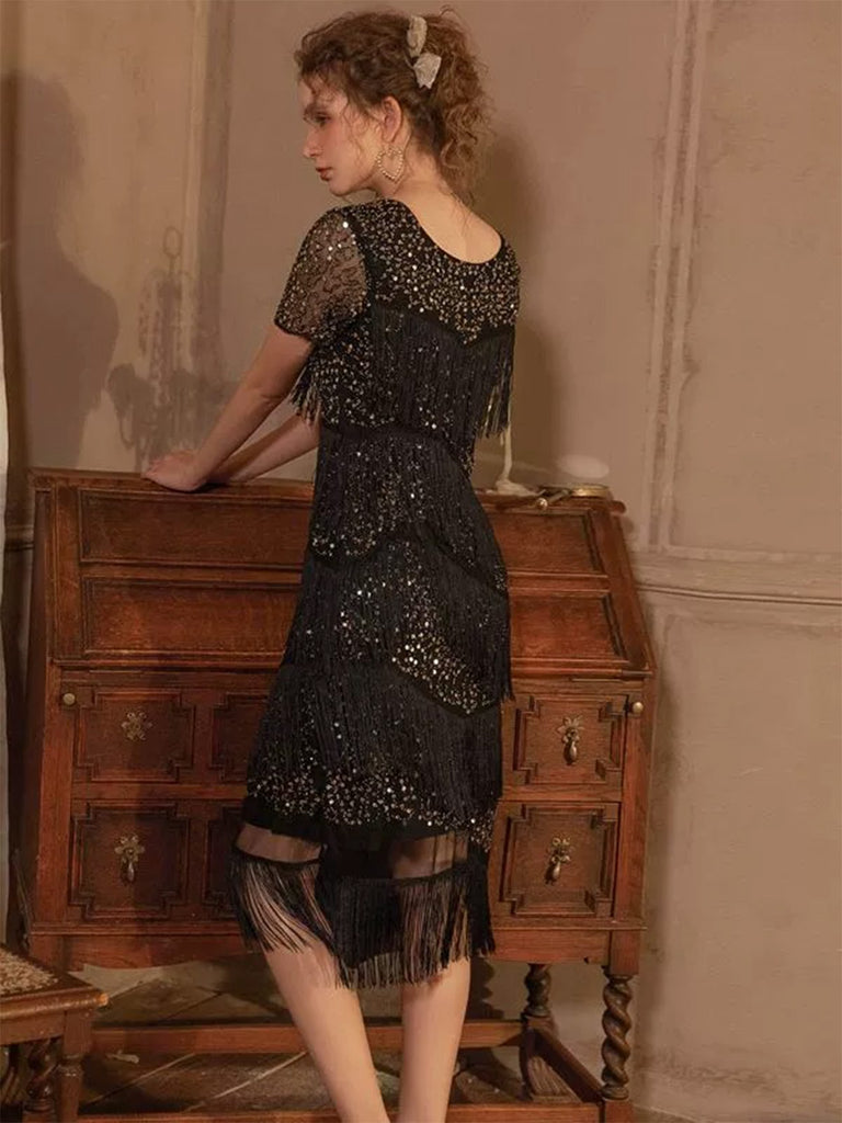 Robe à franges noire à paillettes charleston des années 1920