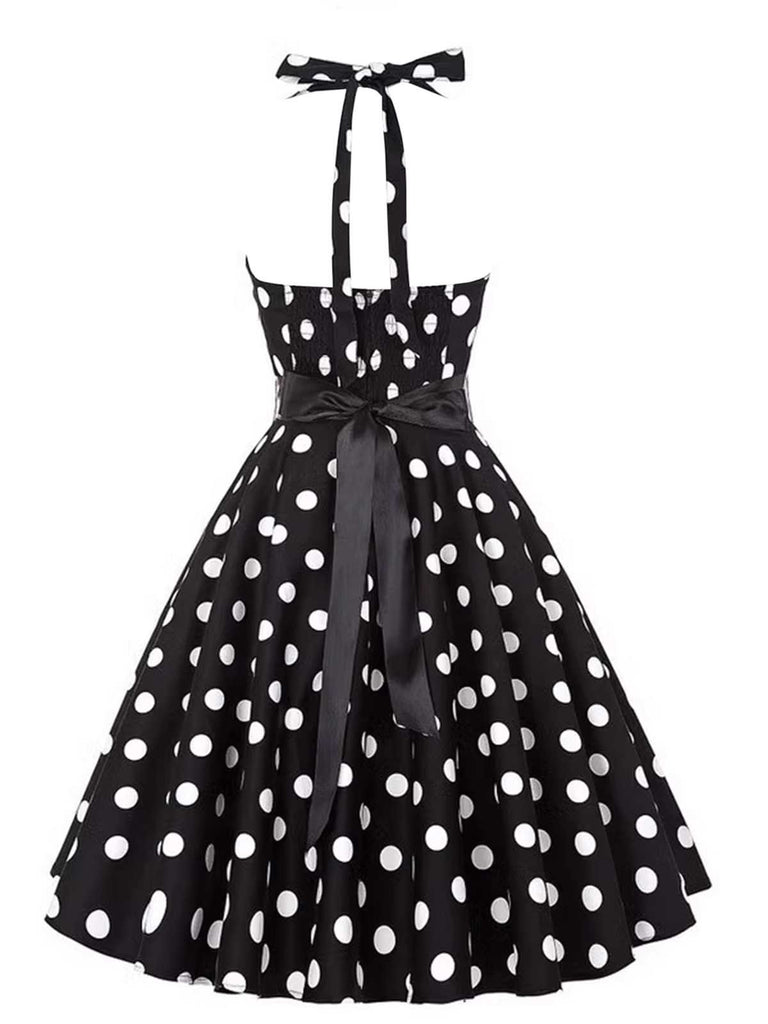 Robe ceinturée à pois contrastés dos nu noir des années 1950