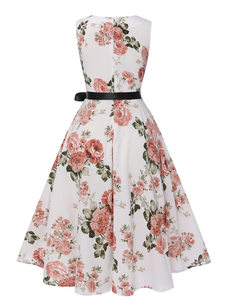 Robe vintage avec ceinture et nœud fleuri des années 1950