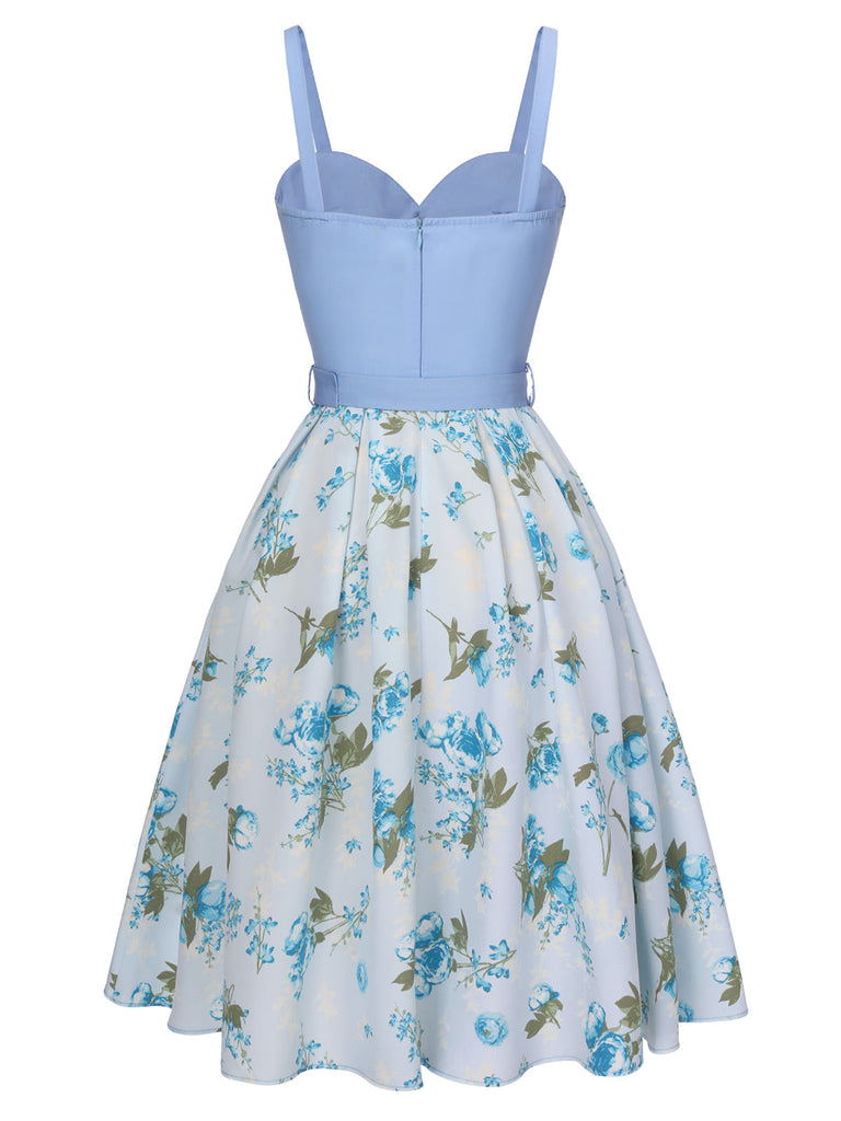 Robe à bretelles bleue avec ceinture florale des années 1950