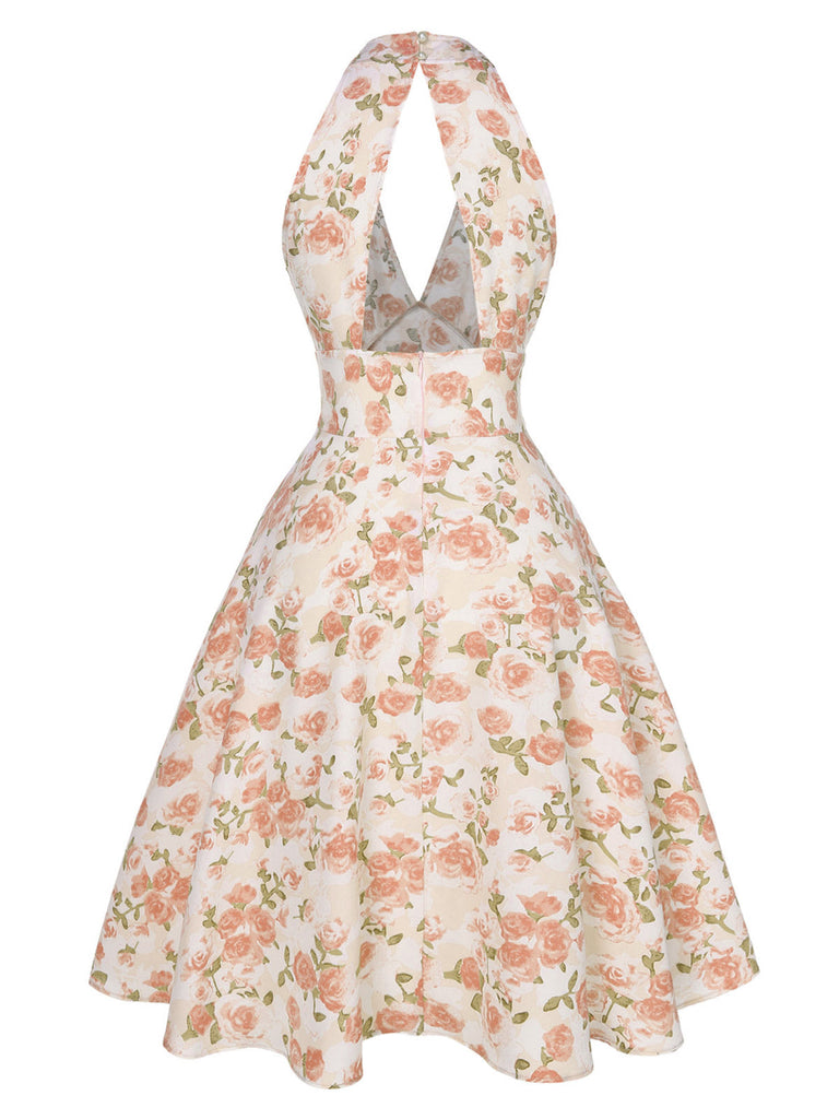 Robe rose à col en V et motif fleurs des années 1950