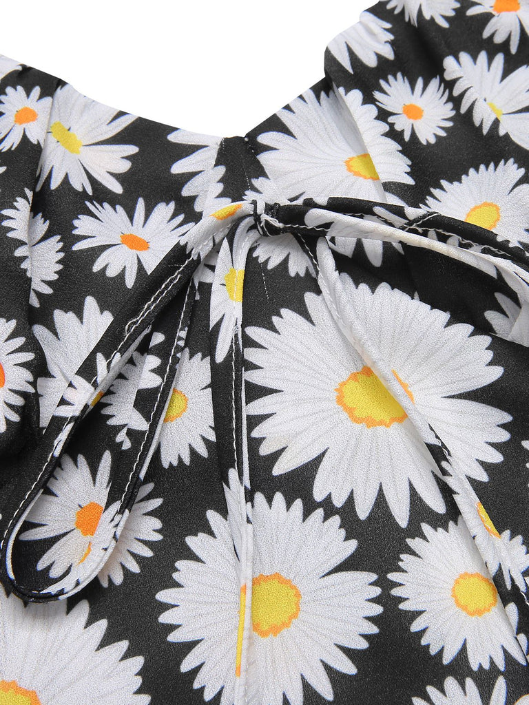 Robe noire à bretelles spaghetti Daisy des années 1960