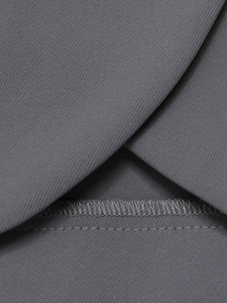 Manteau court boutonné gris années 50 à col montant