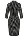 Robe noire à pois et col noué des années 1960