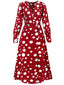 Robe à pois et col en V avec fente latérale des années 1940