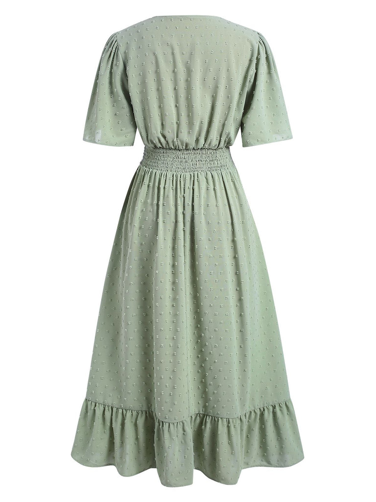 Robe verte à volants et pois suisses des années 1940