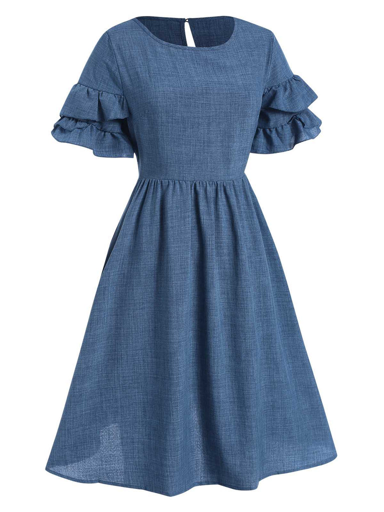 Robe trapèze bleue à volants superposés des années 40