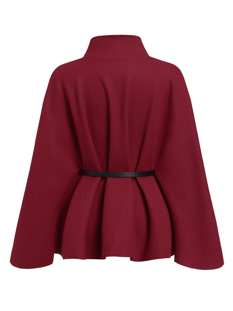 Manteau cape uni ceinturé rouge vin des années 1960