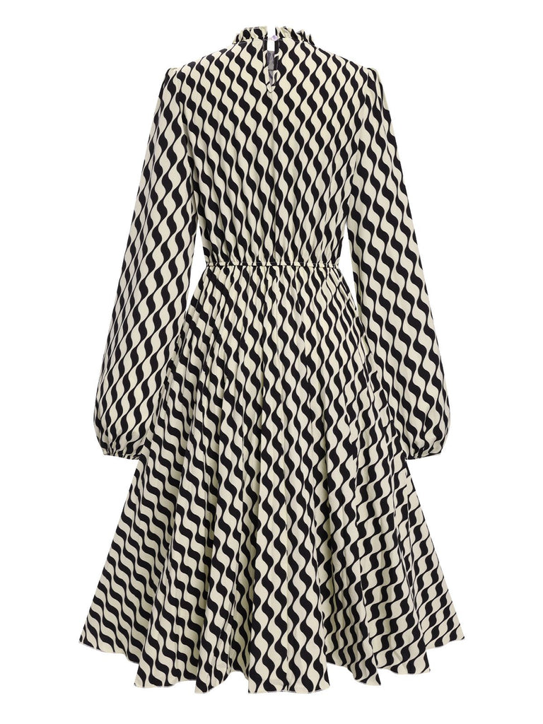 Robe plissée à chevrons et manches ballon noires des années 40