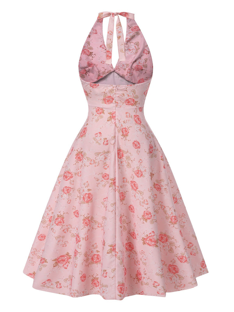 Robe licou à col en V et motif floral rose des années 1950