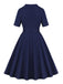 Robe ceinturée à revers bleu foncé des années 1950