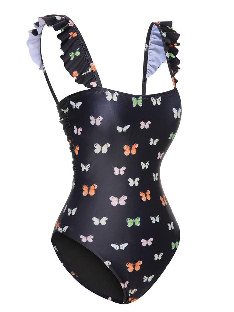 Maillot de bain une pièce noir à manches évasées papillon des années 1950