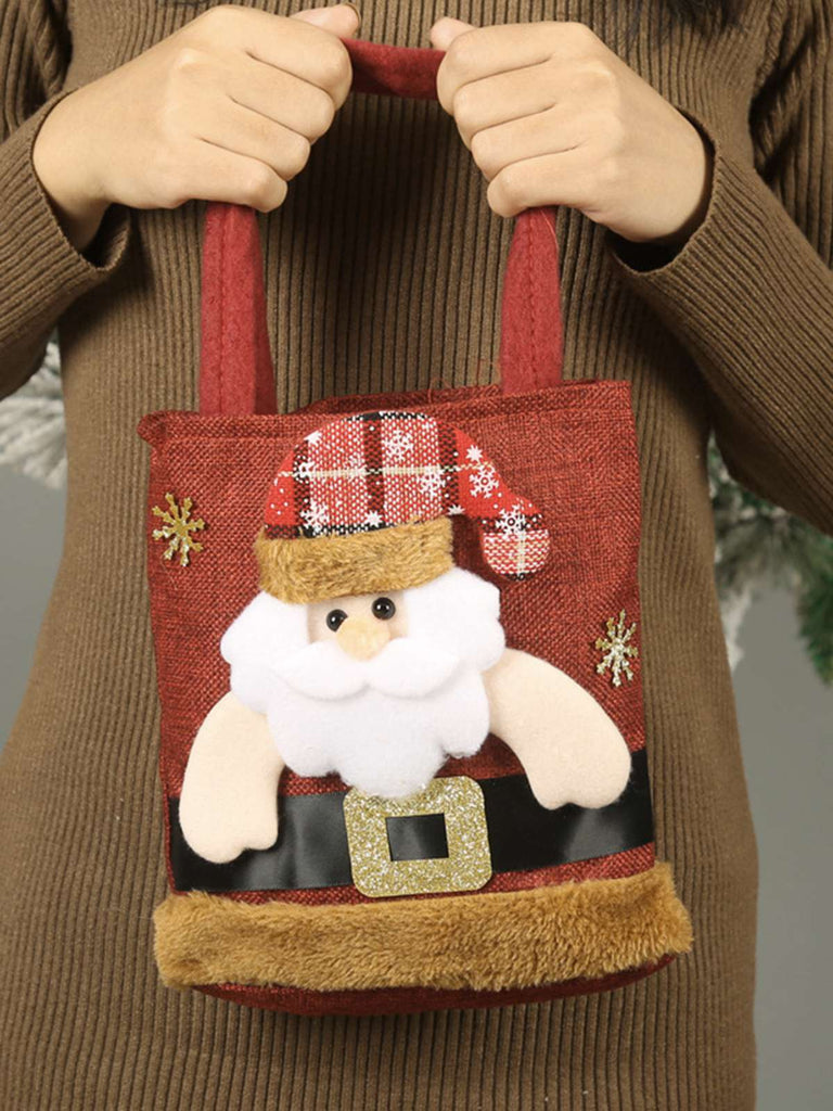 Sac à main rouge de Noël avec bonbons en 3D